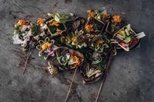 sacrificial offerings on road in Bali - bali etiquette