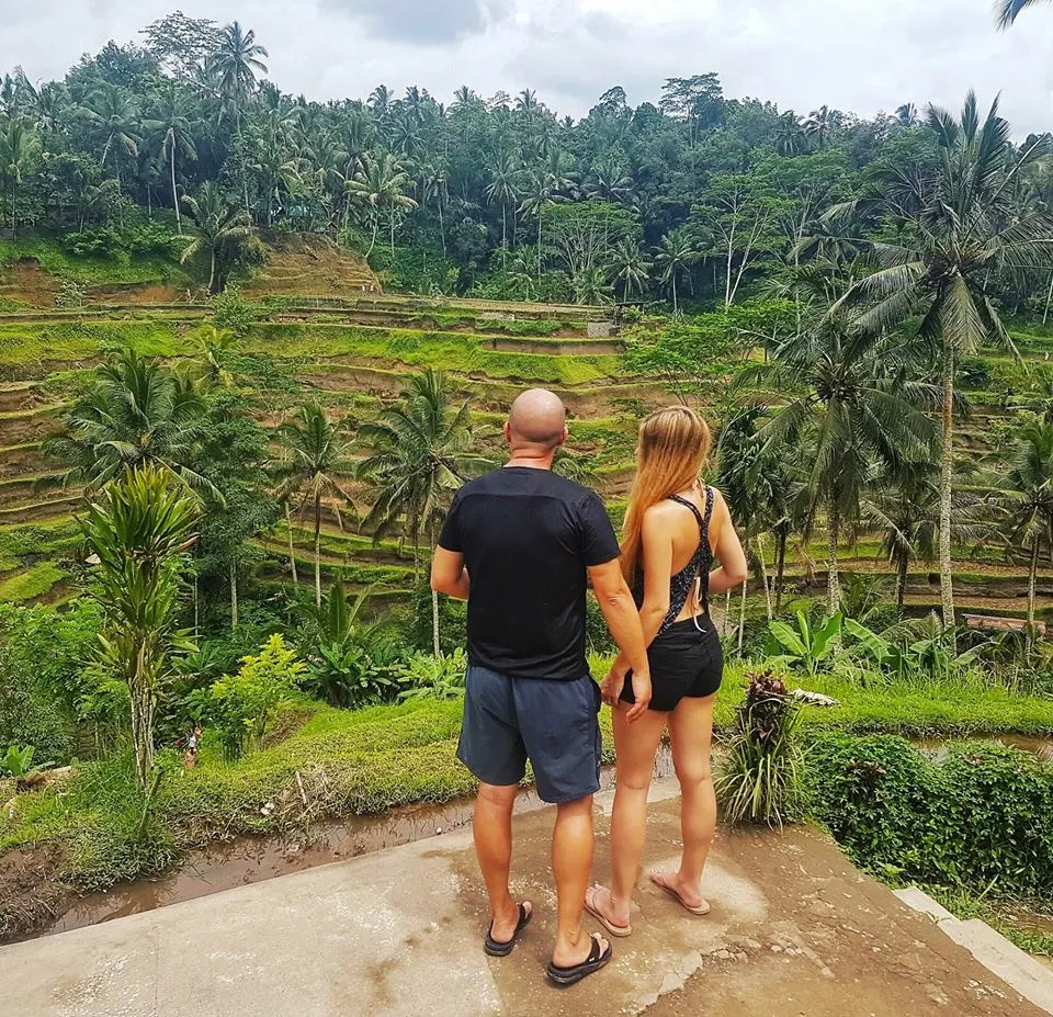 couple on tour in bali by rice fields