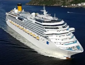 Costa Favolosa cruise ship in dark blue ocean
