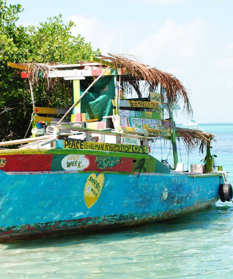old boat on belize beach