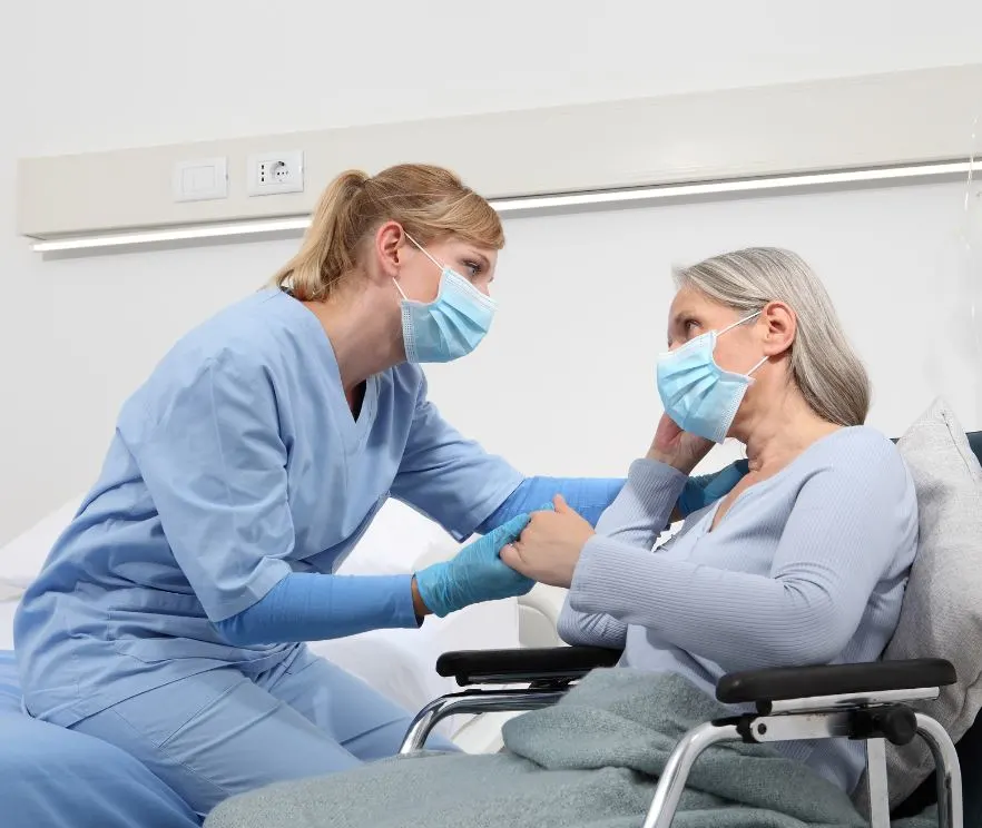 masked nurse and patient