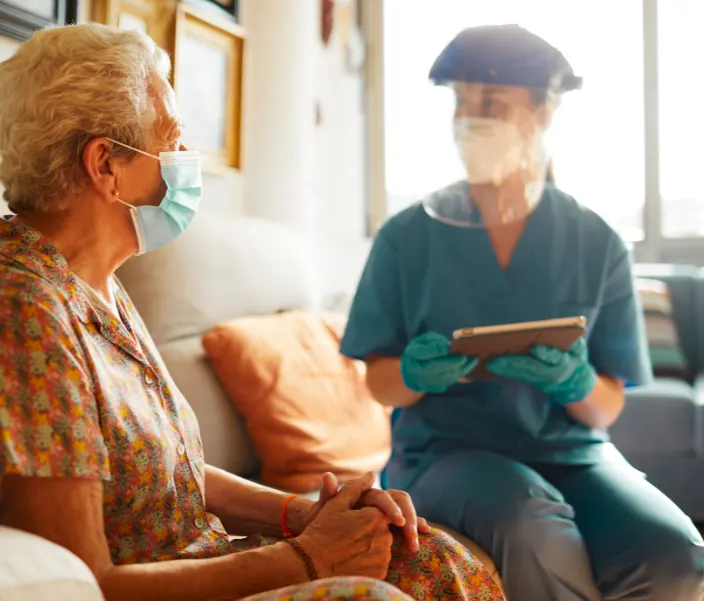 covid mask nurse vulnerable old lady