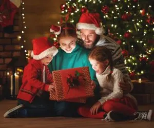 family opening christmas presents
