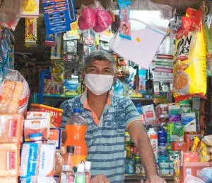 indian market shop owner mask
