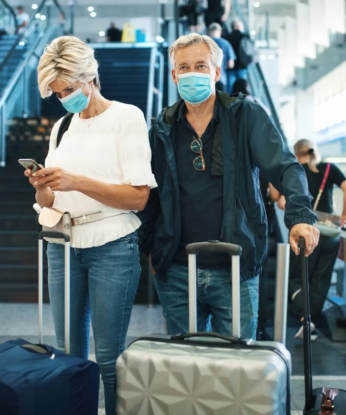 older couple airport masks