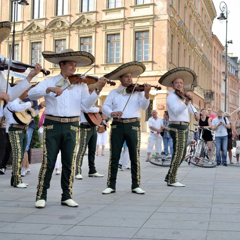 Mariachi band playing music during a festival