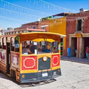 Tourist Bus In Historic City Center Of San Miguel de Allende, Guanajuato, Mexico