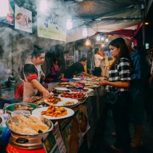 Thai woman sales at the Saturday Night Market on August 27, 2016 in Chiang Mai, Thailand.