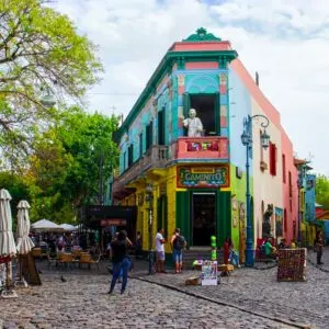 The main square on of the Camanito in the La Boca neighborhood of Buenos Aires features brightly colored buildings and cobblestone streets that are a popular tourist destination