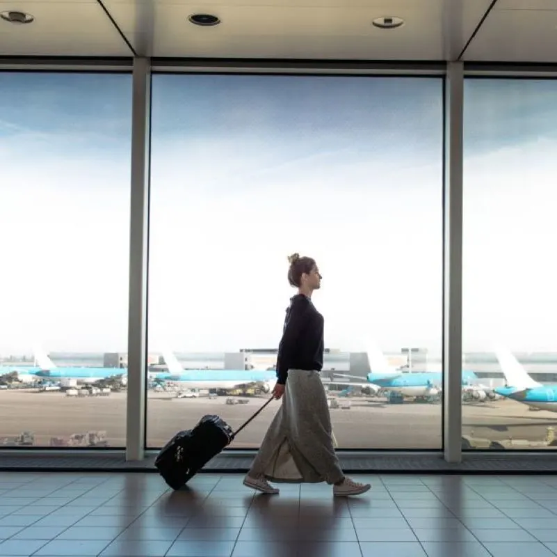female travelers suitcase