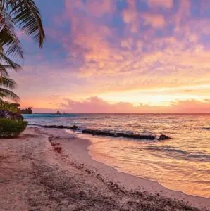 Colorful vibrant sunset over the pacific ocean at scenic natural beach Viti Levu, Fiji. Korotogo Coast, South Coast, Western Division, Fiji, Oceania