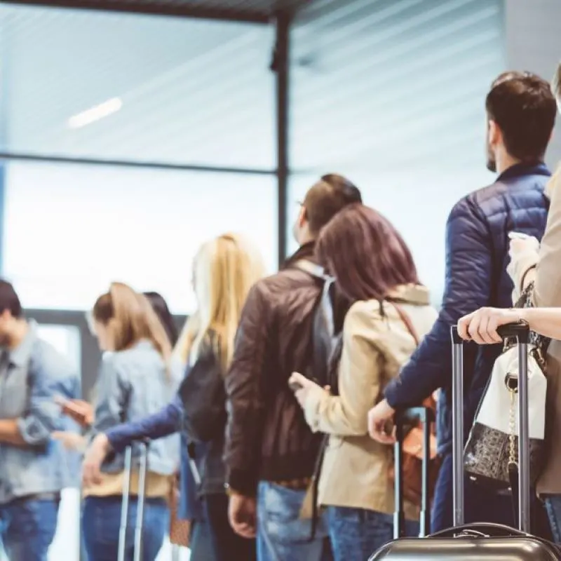 travelers queue check in