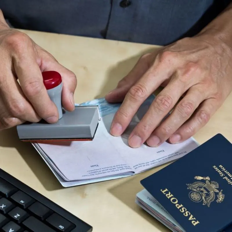 US Passport Getting Stamped At Border Control