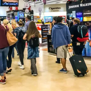 Passengers Transiting Through Duty Free Zone In Cancun International Airport