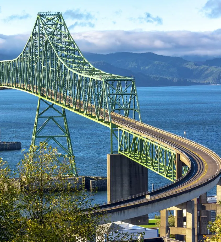 Green metal bridge leading into Astoria, Oregon across the Columbia river, pacific