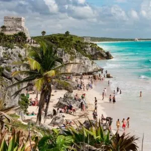 tourist by the Tulum ruins