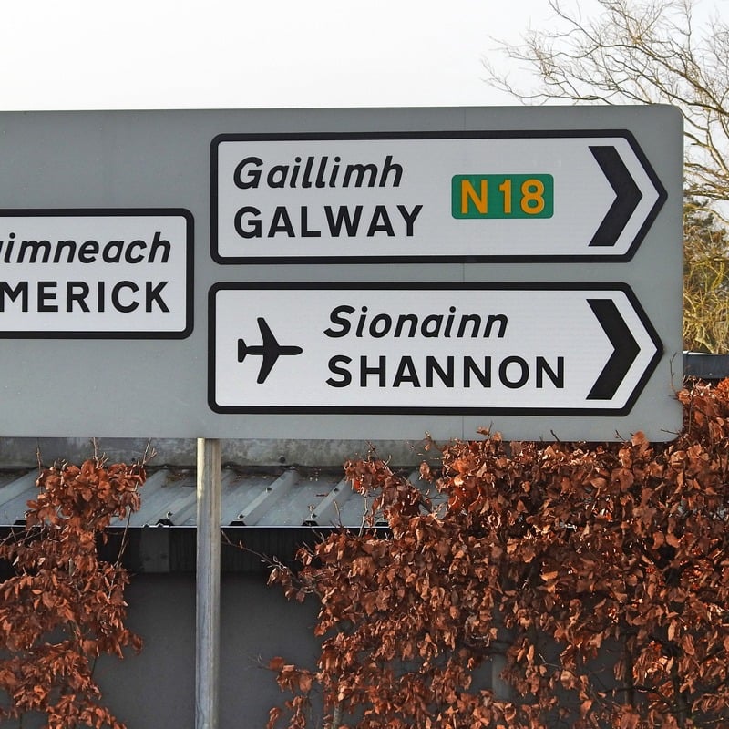 Irish Road Sign Pointing To Shannon Airport In Western Ireland