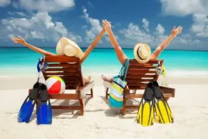 Happy Couple Enjoying A Beach Day In The Caribbean, Unspecified Beach Location