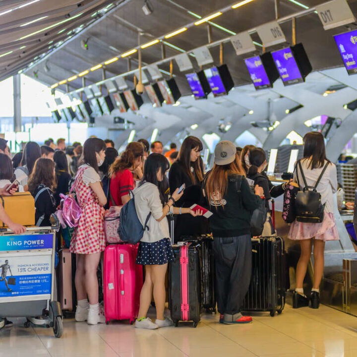 Long Wait Line At Airport Check In Counter - Travel Off Path