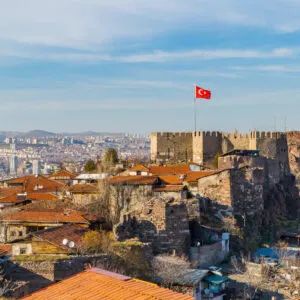 View Of Ankara Fortress With The Turkish Flag Flying High Above The Ancient Structure, Ankara, Capital Of Turkey