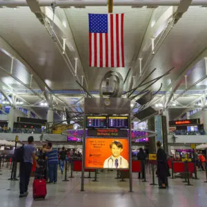 Interior Of JFK International Airport With United States American Flag On Display, United States