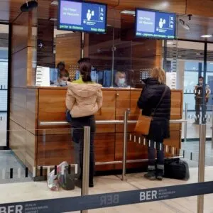 Travelers Undergoing A Border Control Interview At An International Entry Point In Berlin, Germany