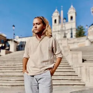 Young Male Tourist Posing For A Picture At The Spanish Steps In Rome, Italy