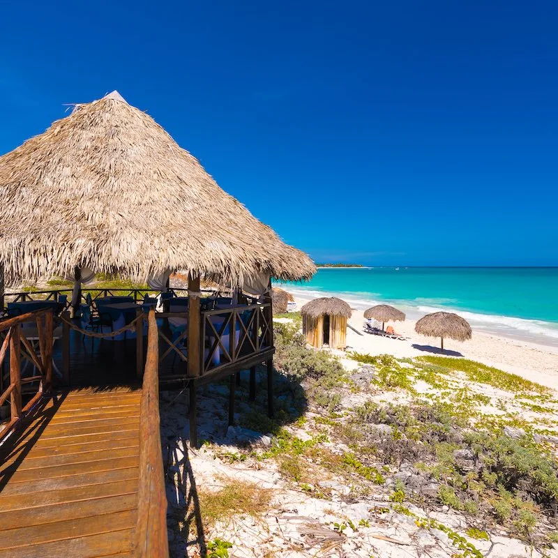 Gazebo and bridge on the sandy beach Playa Paradise of the island of Cayo Largo, Cuba