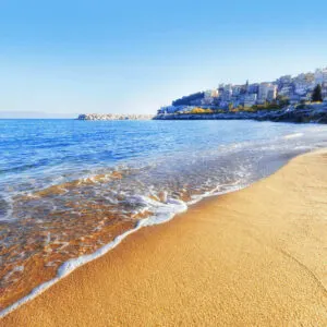 Golden Sand Beach In The Mediterranean Sea, Kavala Beach In Northeastern Greece, Region Of Eastern Thrace And Macedonia, Southeastern Europe