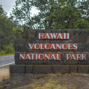 a sign welcomes visitors to Hawaii Volcanoes National Park