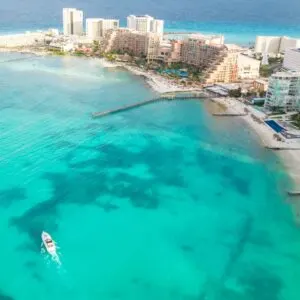 Aerial view of cancun hotel zone with a boat in the ocean