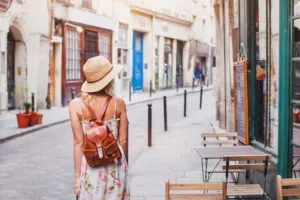 Woman,Tourist,Walking,On,The,Street,,Summer,Fashion,Style,,Travel