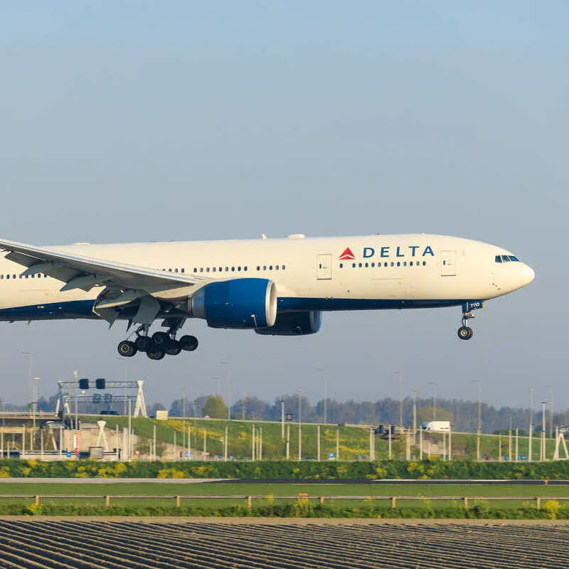 Delta Airlines Aircraft Pictured Mid-Air As It Takes Off From An Airport Or Approaches Landing, Air Travel