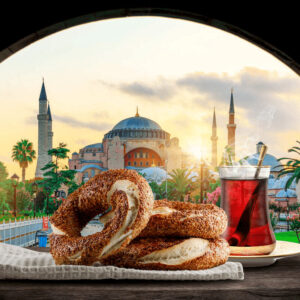 Traditional Simit, A Turkish Bagel, And A Cup Of Turkish Cai Or Turkish Tea Sitting On A Windowsill With A View Of The Hagia Sophia, In The Historical Sultanahmet Square In Istanbul, Turkey, Turkyie