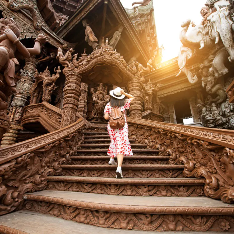 Woman exploring temple in Thailand
