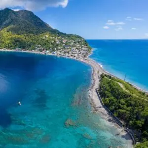 Aerial view of dominica with atlantic and caribbean ocean almost touching each other