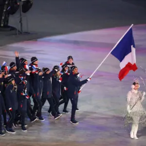 Olympic competitors from France march at the opening ceremonies