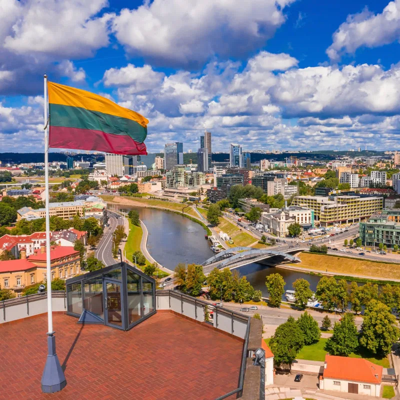 Lithuania flag flying over the city