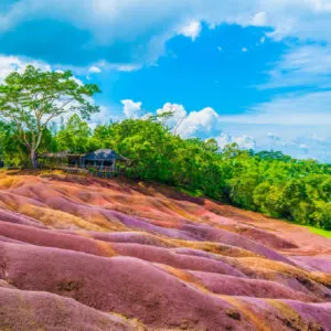 the earth is 7 different shades of purple and orange in Mauritius, a top 2023 destination