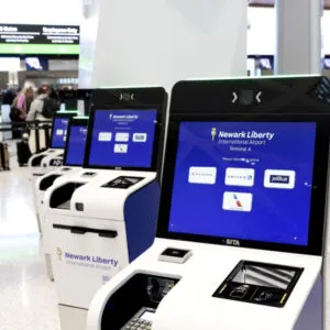 a check in kiosk awaits passengers at newark airport