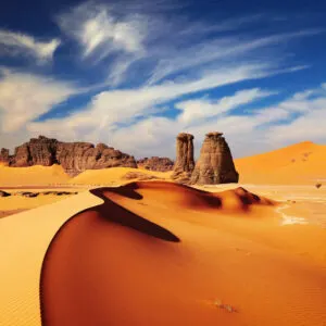 Sand Dunes And Rock Formations In The Sahara, Algeria, North Africa