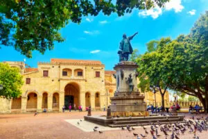 Columbus statue and Basilica Cathedral of Santa Maria la Menor in Santo Domingo Colonial zone