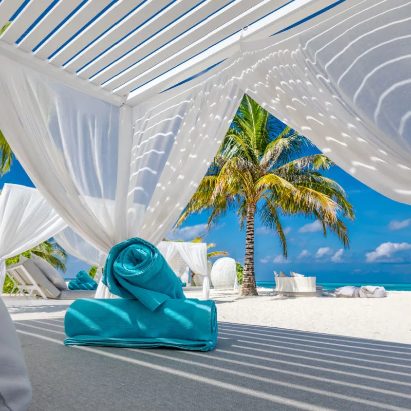 a private adults-only cabana on the beach