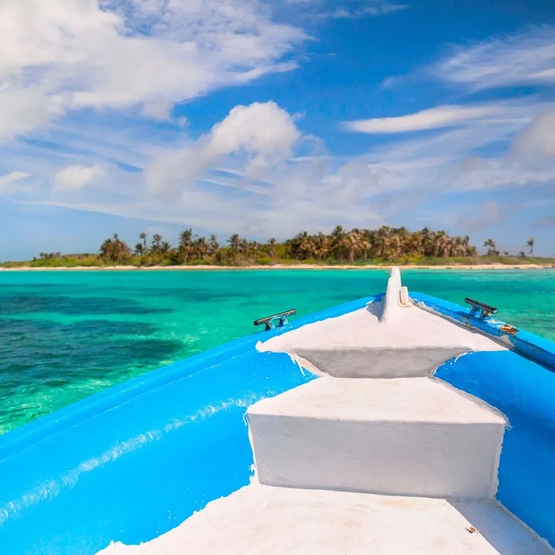 View Of Isla Contoy From A Boat As It Approaches Land, Off The Mainland Coast Of The Mexican Caribbean, Mexico