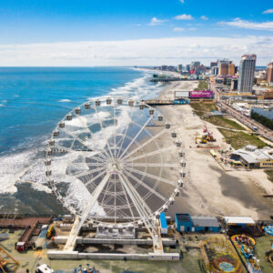 Atlantic city boardwalk and Ferris wheel with the ocean