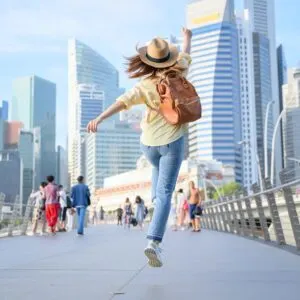 Happy young woman enjoying day in Singapore