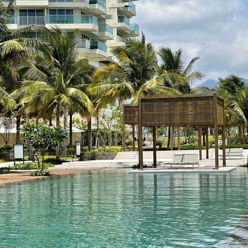 A Pool In The Alma Cam Ranh Resort Lined By Palm Trees, Vietnam, Southeast Asia