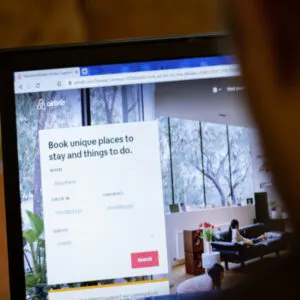 Airbnb website on laptop screen close up