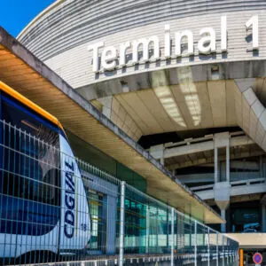 Close-up view of a CDGVAL airport shuttle stationing at the terminus station at the foot of the Terminal 1 of Paris-Charles de Gaulle Airport