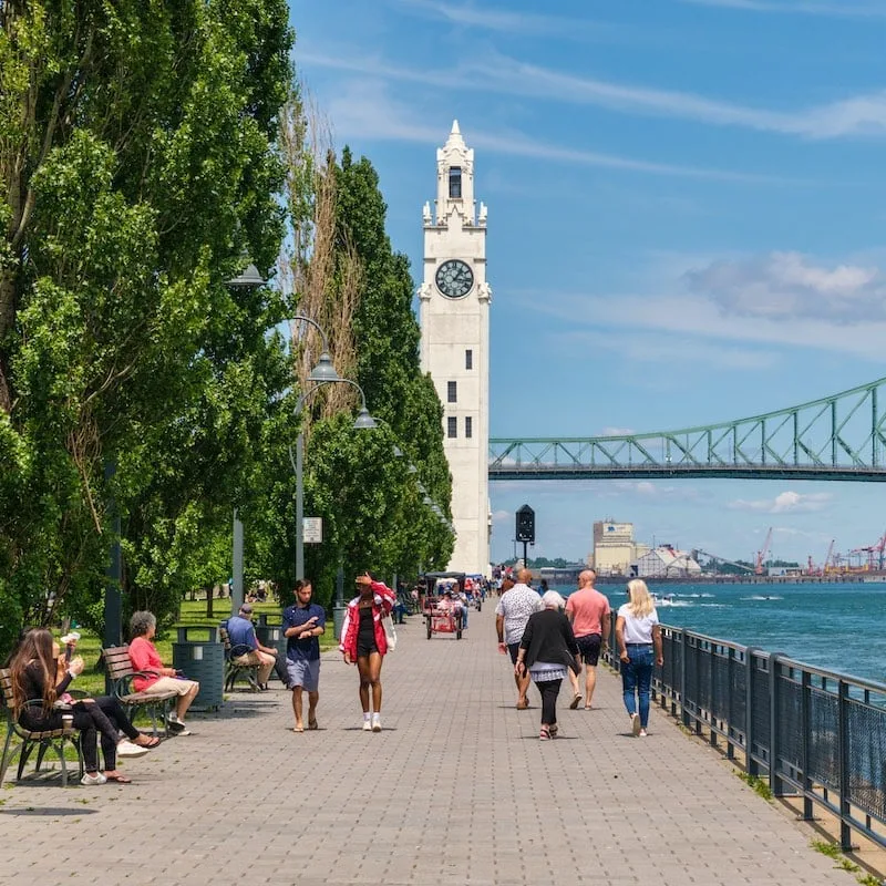 People enjoying warm summer day at the Old Port near the Clock Tower